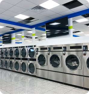commercial washing machines and dryers display
